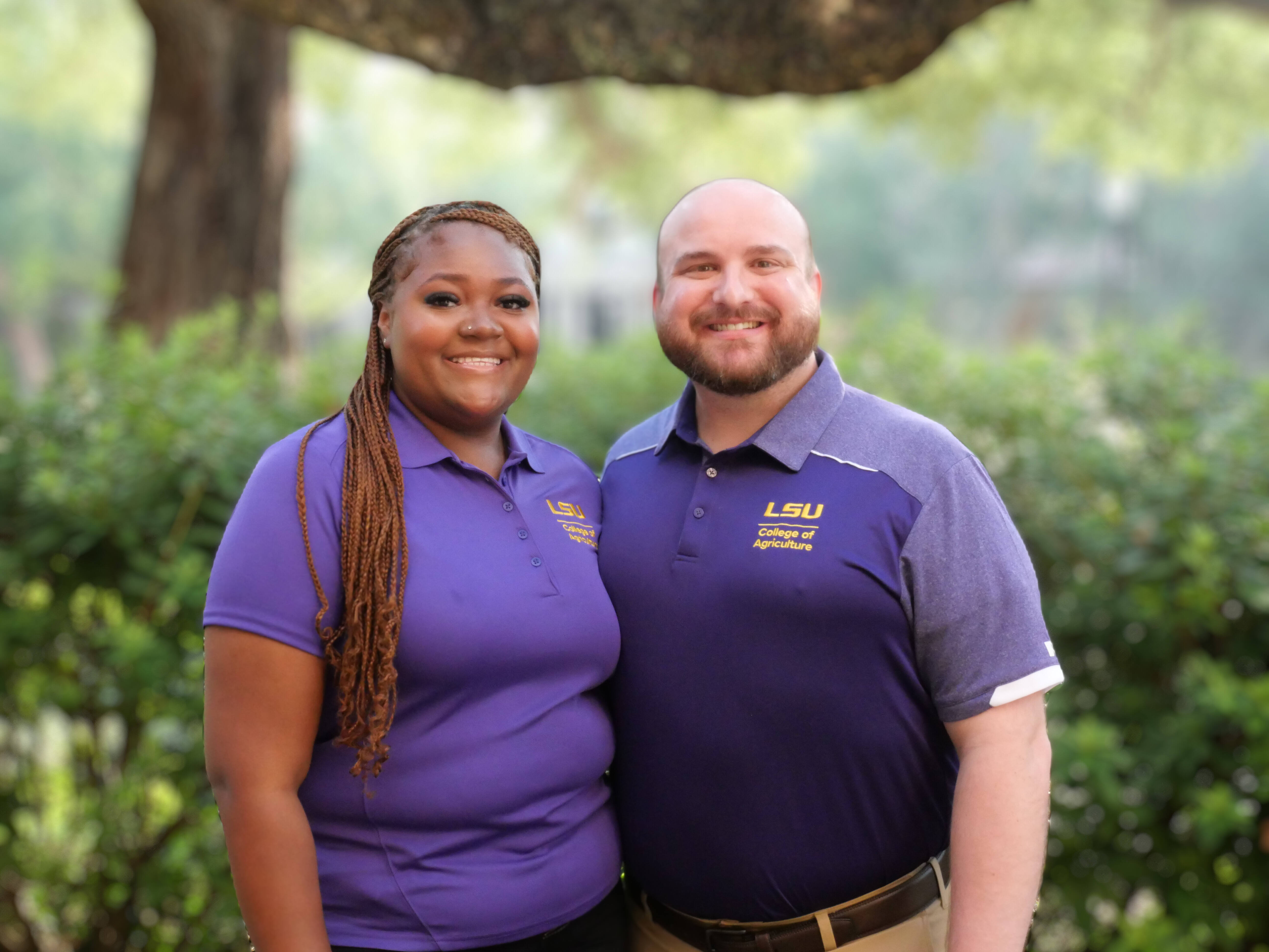 Henry Hebert stands with peer mentor, Alyssa Greenwade