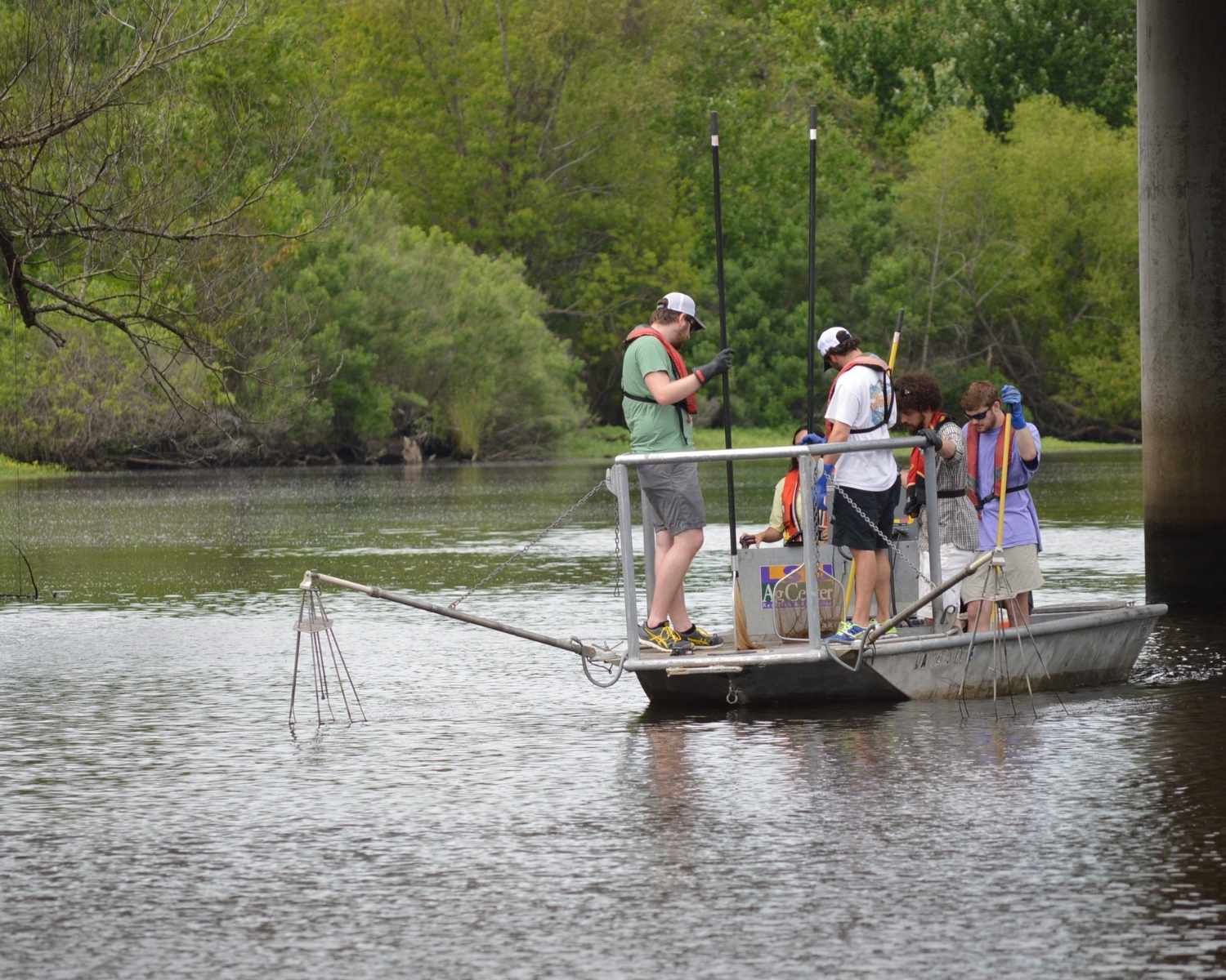 Students on boat with nets