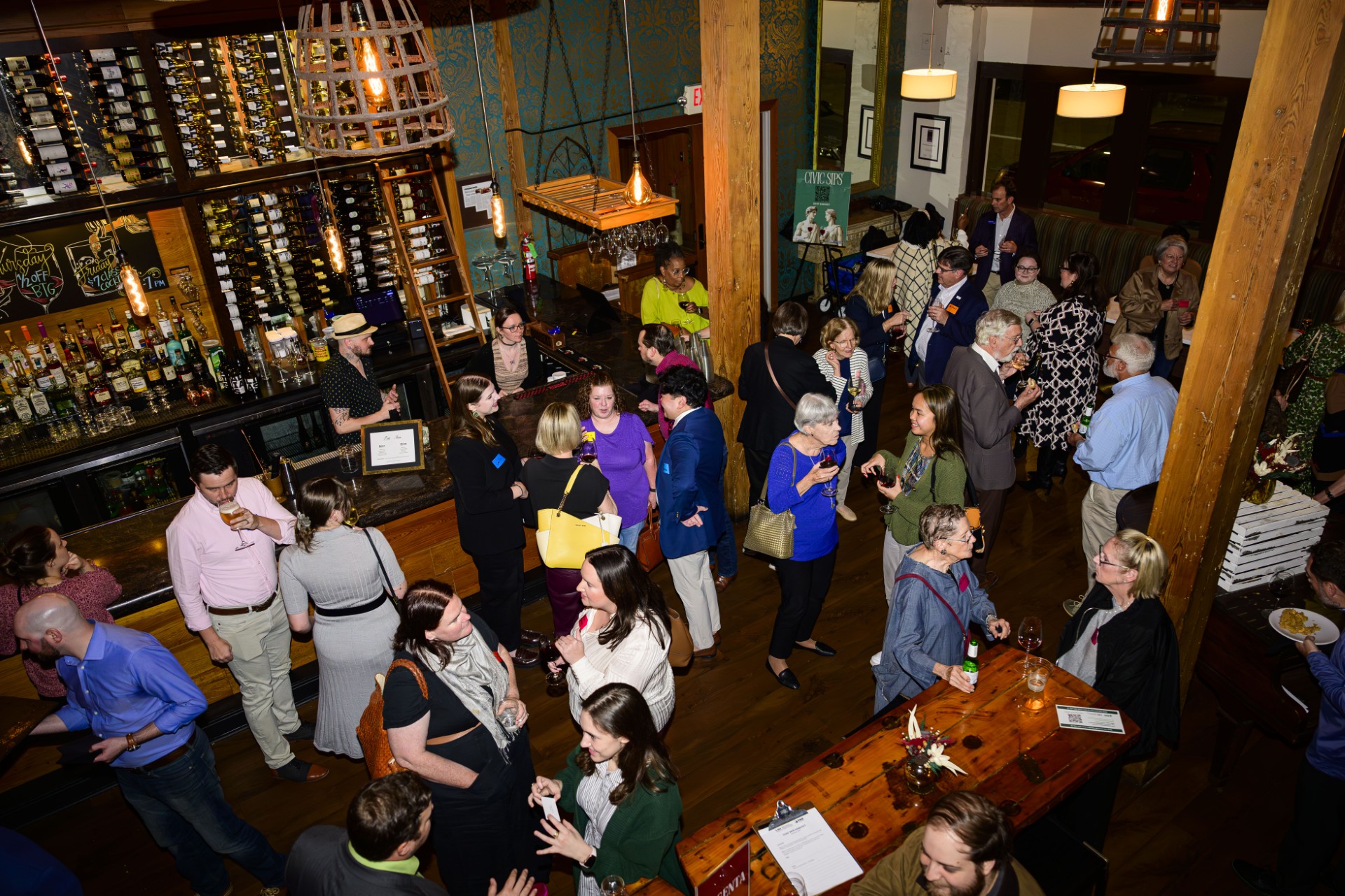 The crowd at civic sips