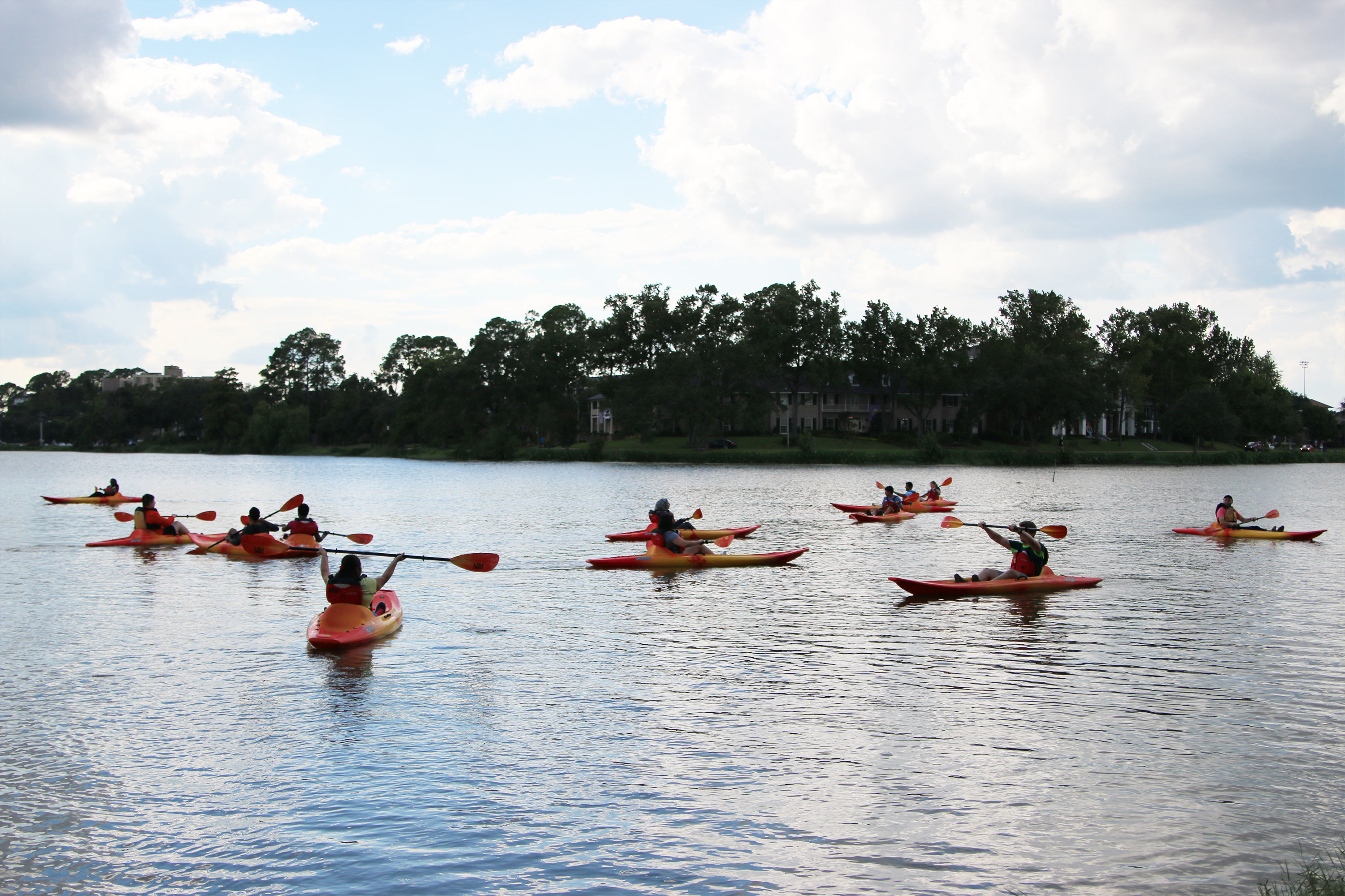 bucnh of students kayaking